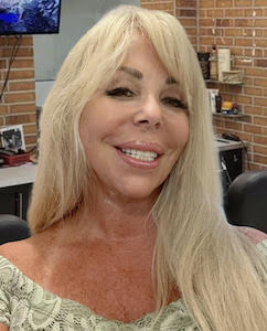 Carmela R